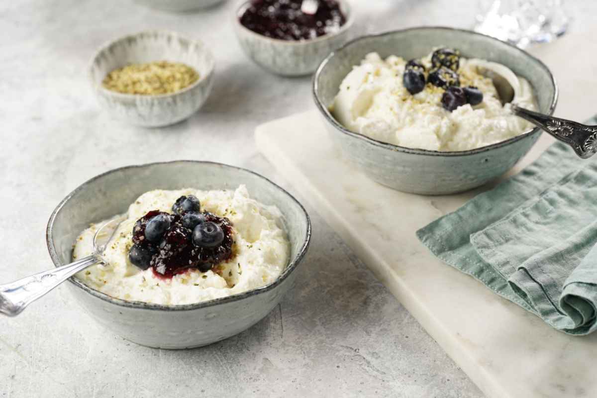 Traditional icelandic yoghurt called Skyr Icelandic skyr served with blueberries and jam