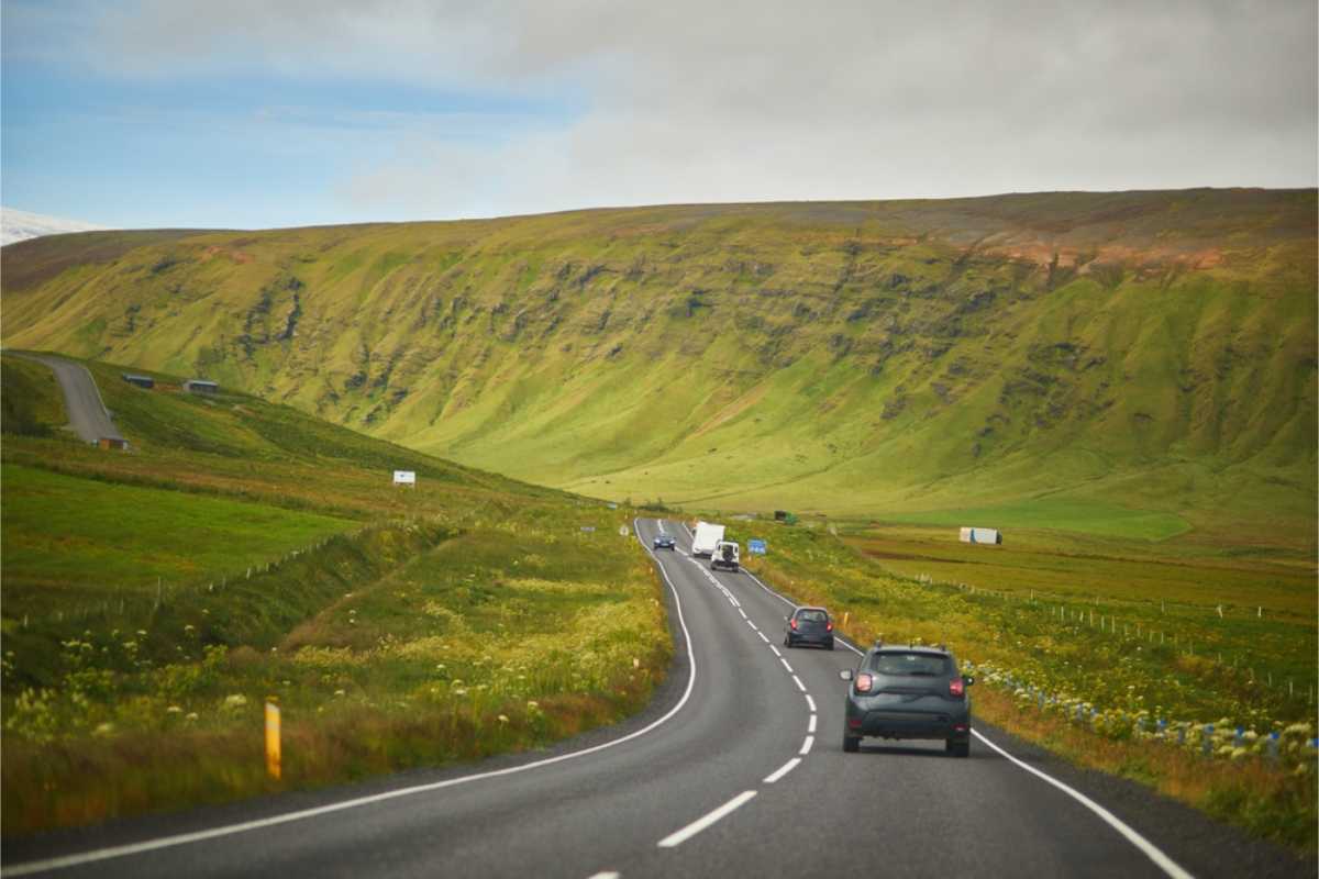 Cars and motorhomes driving the Ring Road during a sunny day