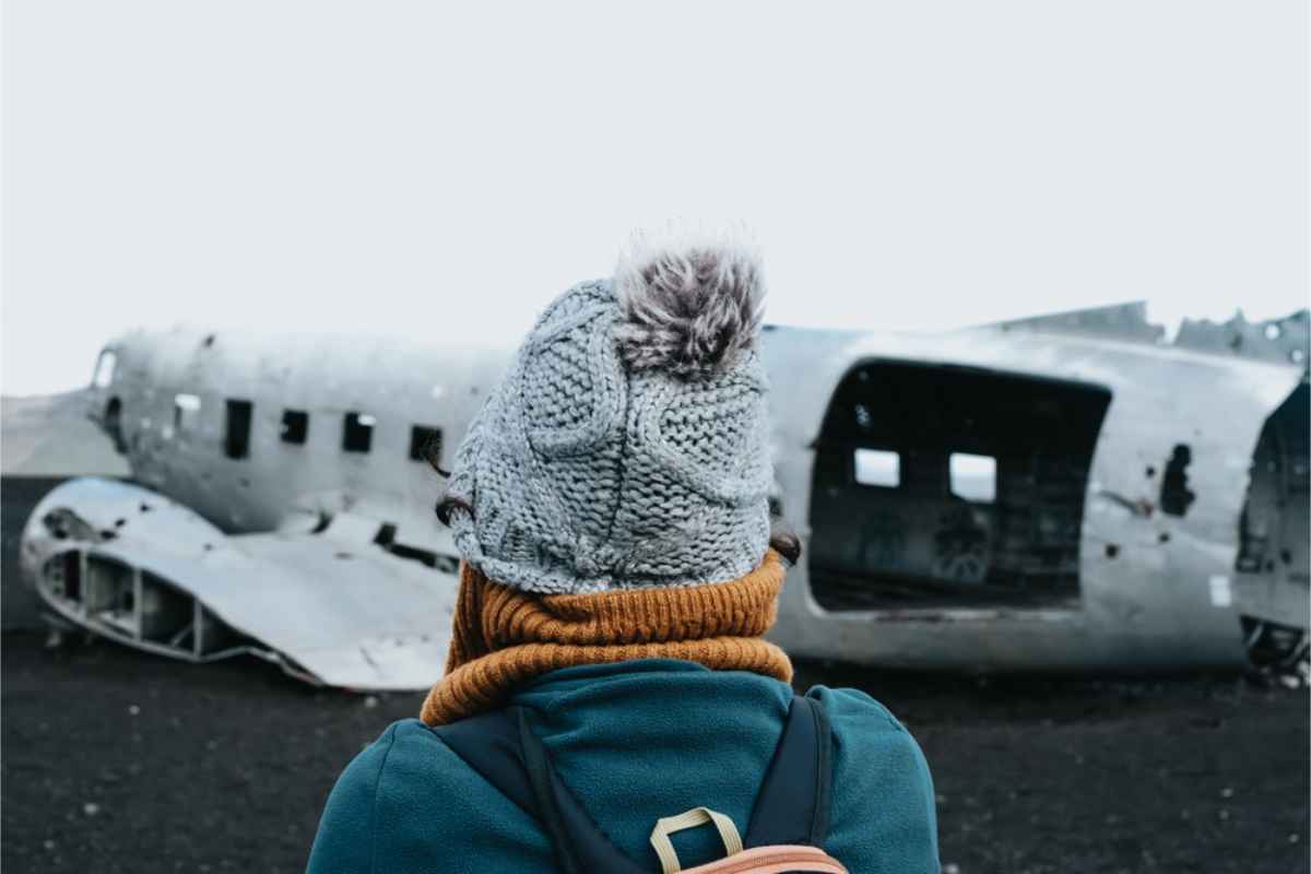 Tourist walking to the DC-3 plane wreck