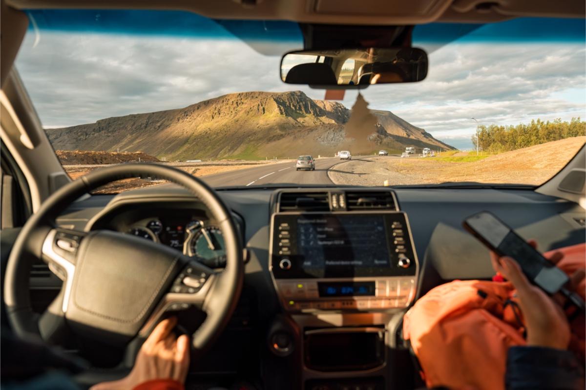 2WD car rental in Iceland Tourists driving their car through Iceland's Ring Road