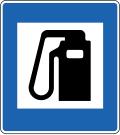 Gas station nearby road sign