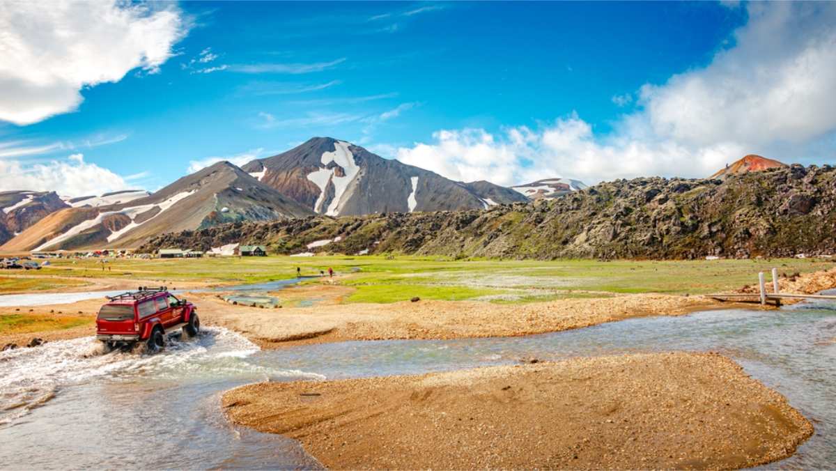 4x4 car fording the last river at Landmannalaugar