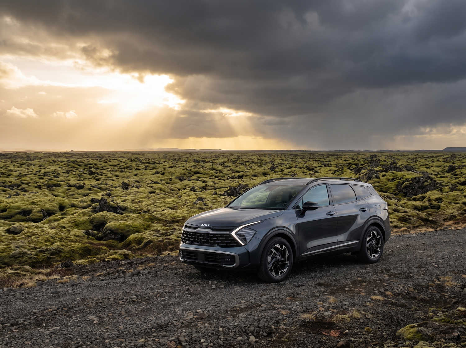 Kia Sportage. A spacious rental car for Iceland, designed to navigate Icelandic weather and gravel roads comfortably with ample space for both passengers and luggage.