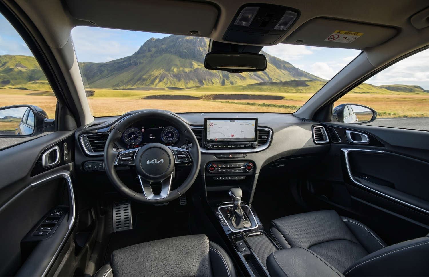 Bright yellow Kia XCeed automatic crossover with GPS, reverse camera, and heated seats, seats 5 with space for 2 luggage, ideal for Iceland trips.
