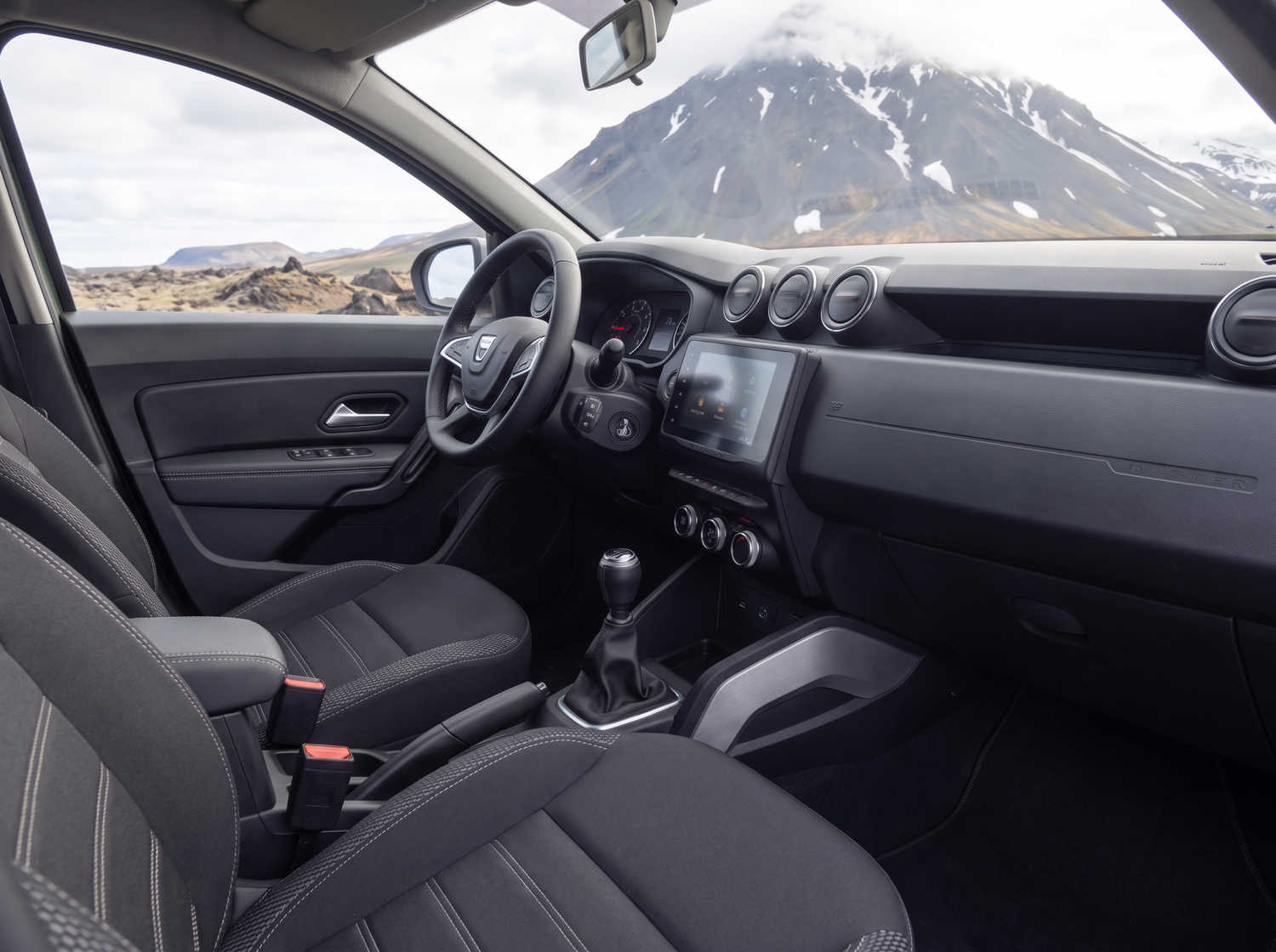 Dacia Duster. A dependable rental vehicle in Iceland designed to handle off-road driving and gravel roads, suitable for exploring remote areas and Icelandic weather conditions.