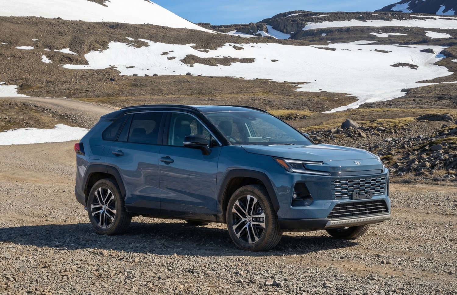 Toyota RAV4. A robust rental SUV ideal for exploring Iceland's rugged terrains, including mountain roads, F roads, and remote areas, with collision damage waiver for extra peace of mind.