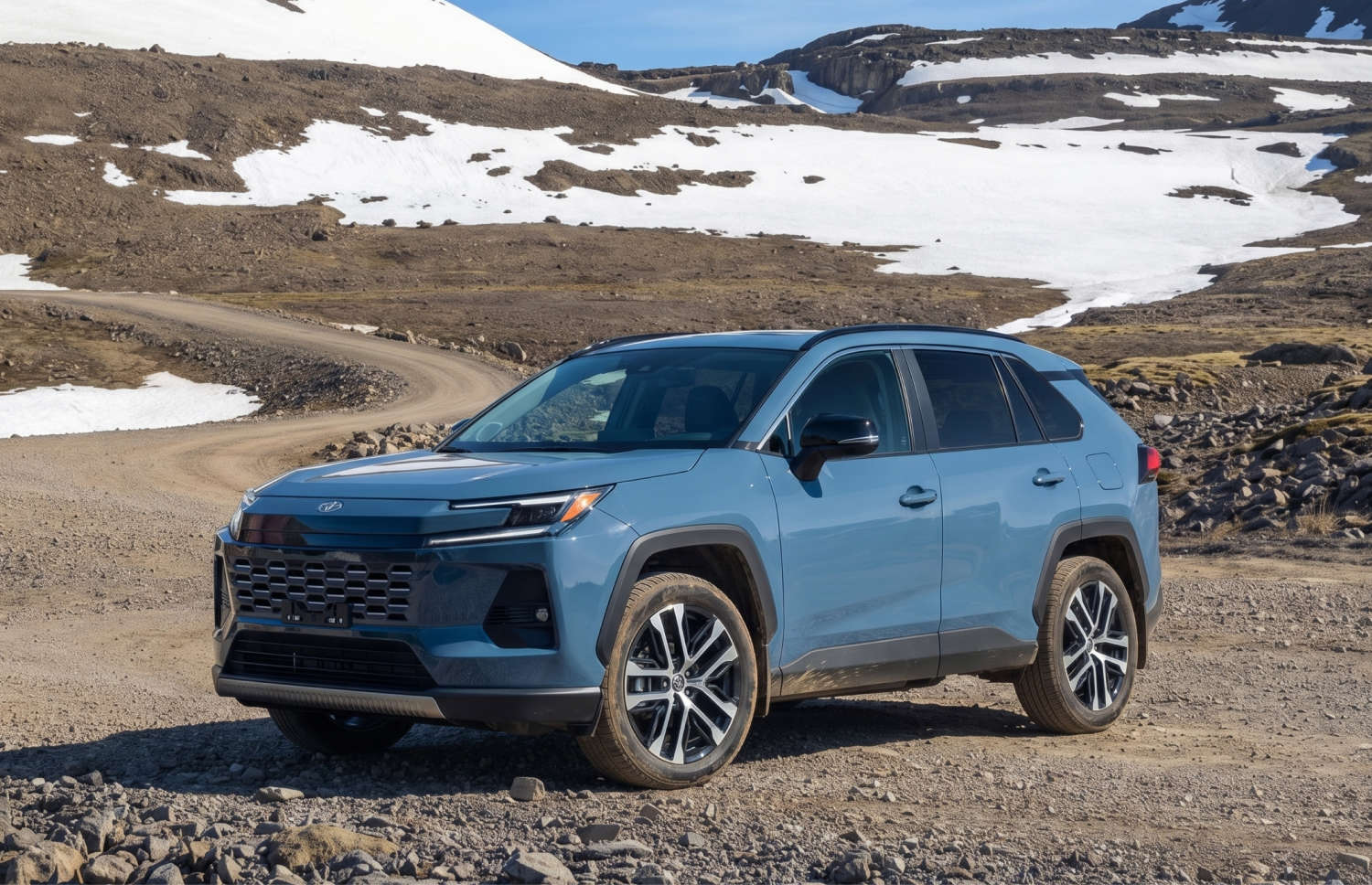 Toyota RAV4. A robust rental SUV ideal for exploring Iceland's rugged terrains, including mountain roads, F roads, and remote areas, with collision damage waiver for extra peace of mind.