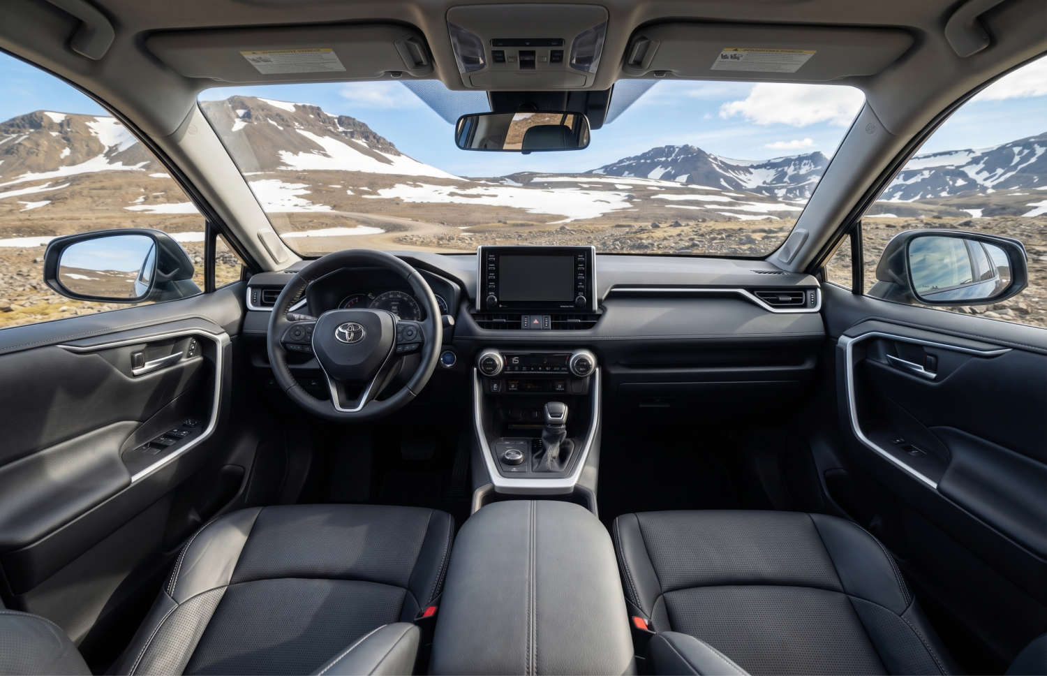 Toyota RAV4. A robust rental SUV ideal for exploring Iceland's rugged terrains, including mountain roads, F roads, and remote areas, with collision damage waiver for extra peace of mind.
