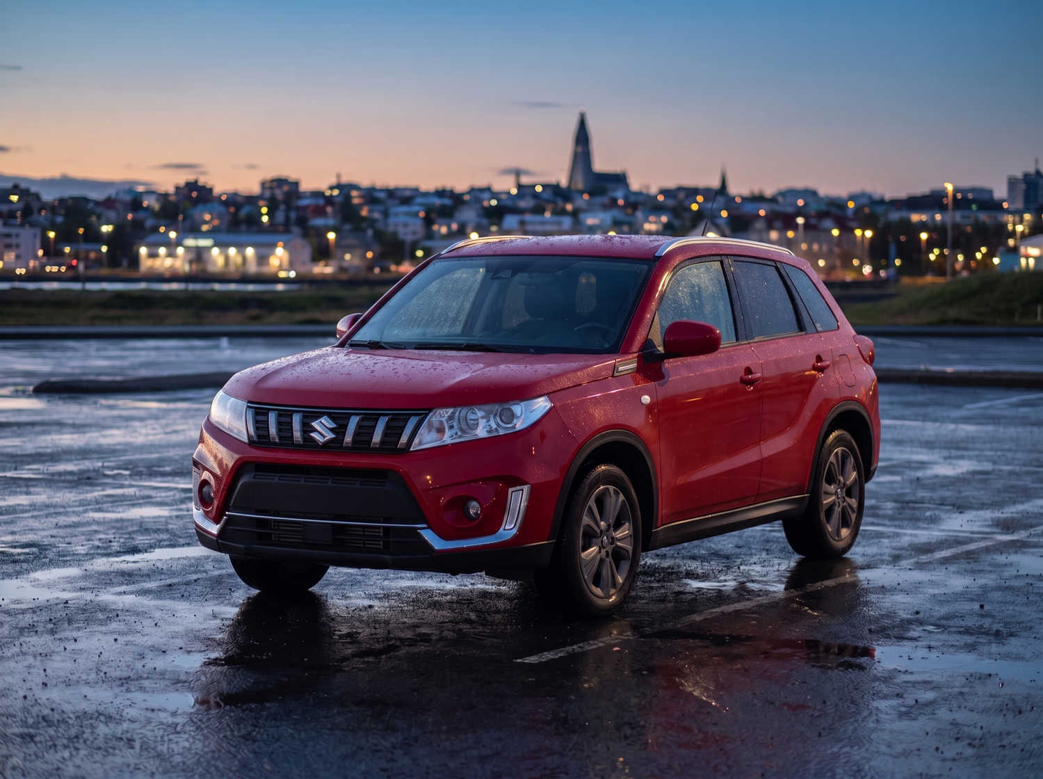 Suzuki Vitara. Ideal for navigating Iceland's highland roads and gravel protection, this rental car offers all the space for a smooth Icelandic road trip.