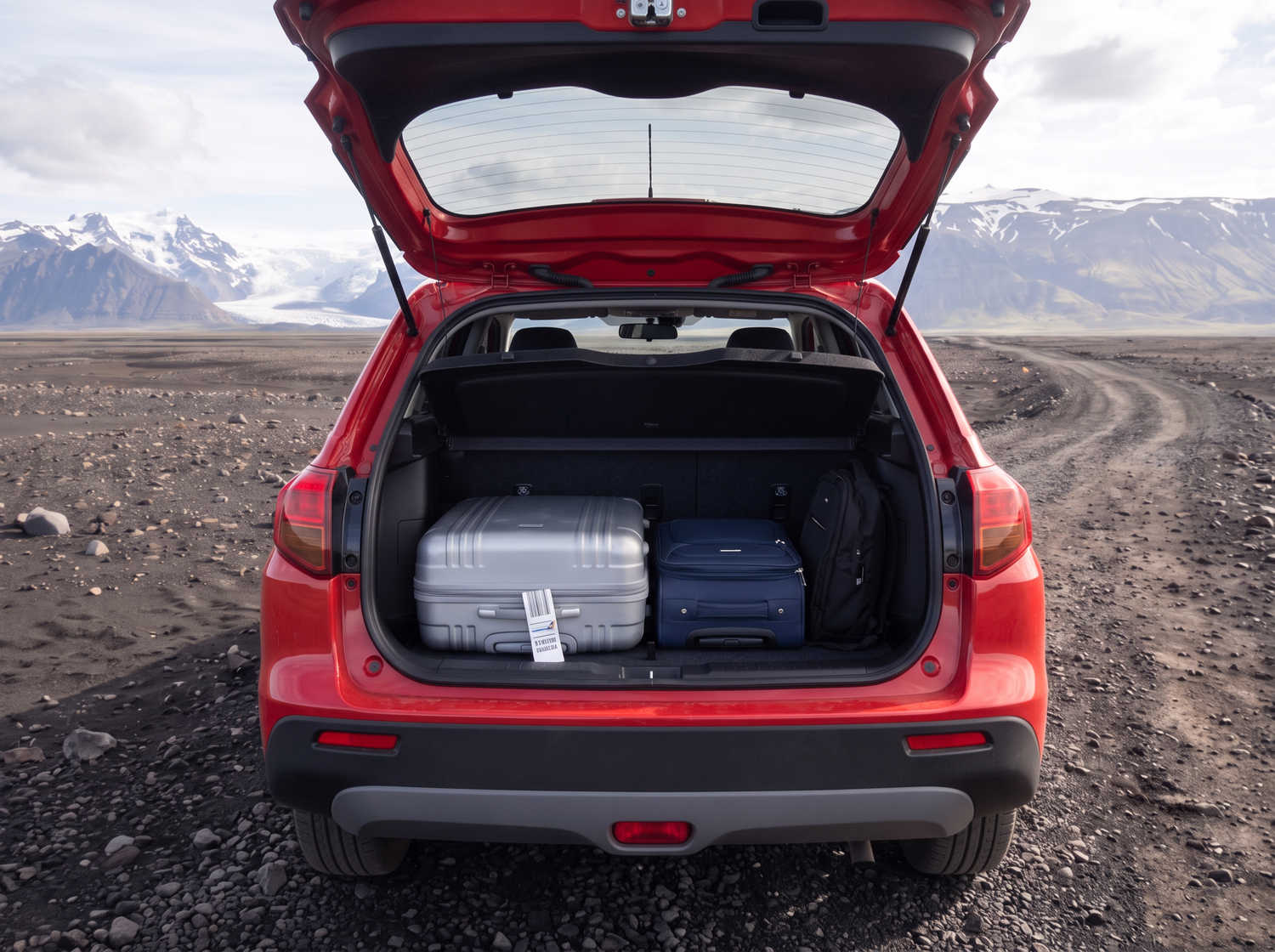 Suzuki Vitara. Ideal for navigating Iceland's highland roads and gravel protection, this rental car offers all the space for a smooth Icelandic road trip.