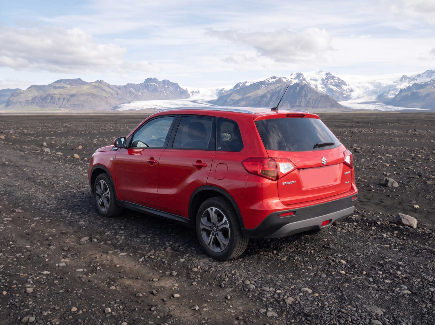 Suzuki Vitara. Ideal for navigating Iceland's highland roads and gravel protection, this rental car offers all the space for a smooth Icelandic road trip.