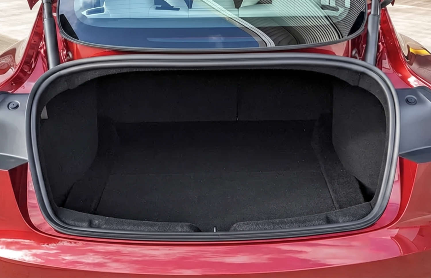 White Tesla Model 3 electric sedan with automatic transmission, GPS, reverse camera, heated seats, and space for 5 passengers in Iceland.