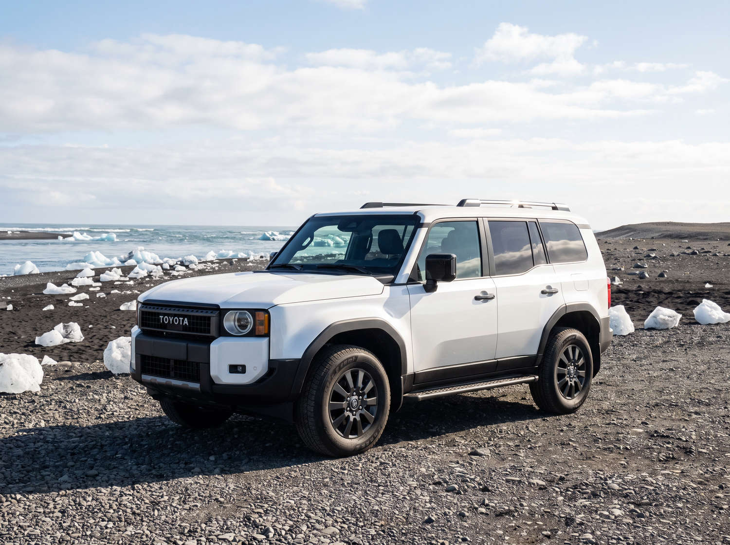 White Toyota Land Cruiser 250 4WD SUV with automatic transmission, 7 seats, USB charger, Bluetooth, and heated seats, perfect for Iceland off-road adventures.