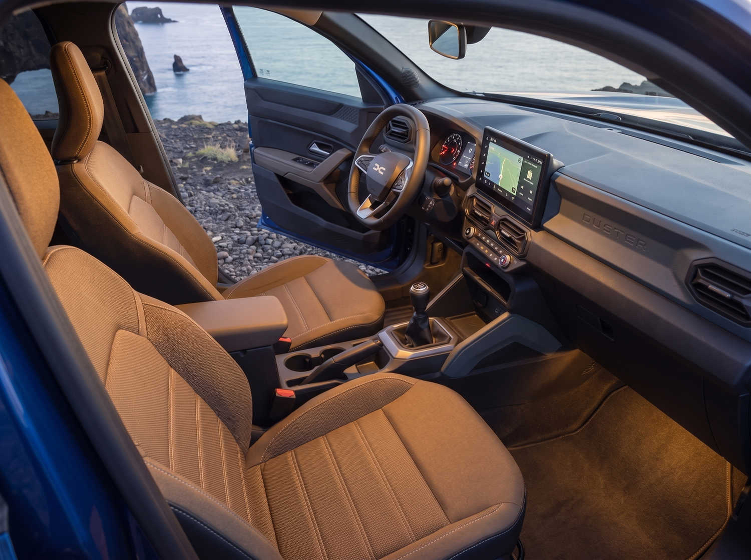 Blue Dacia Bigster SUV with manual transmission and 4WD, seats 5 with 4 luggage capacity, designed for Iceland’s rugged roads and comfort.
