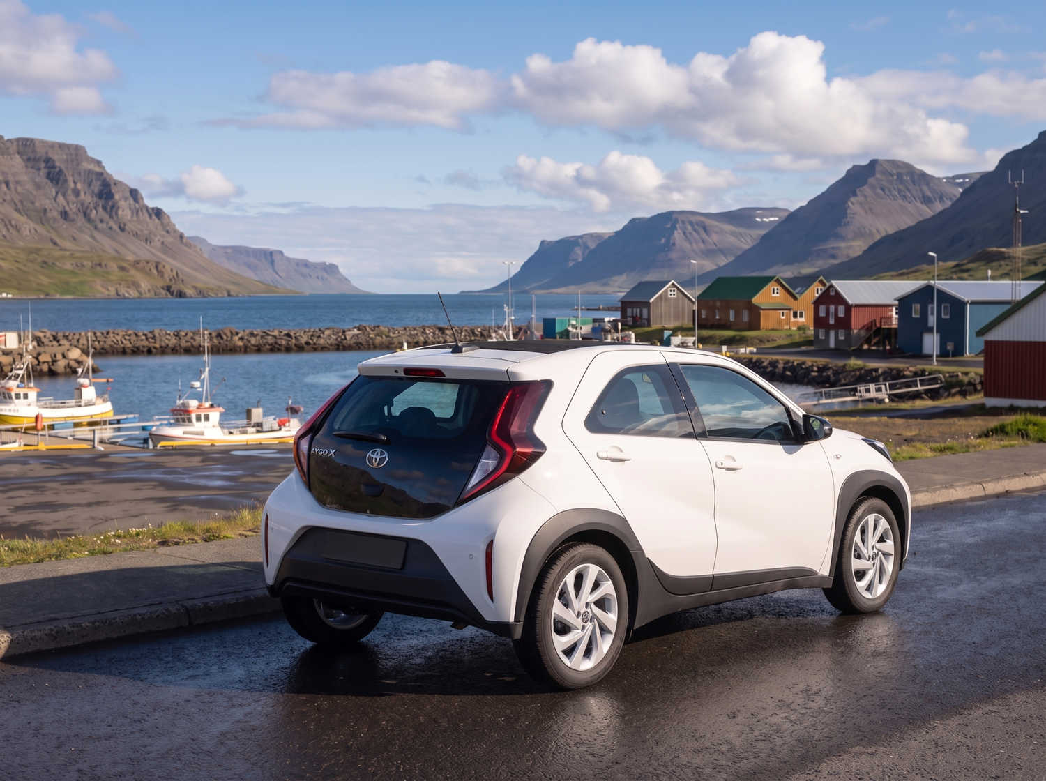 Compact Toyota Aygo in metallic grey with manual transmission, perfect for 4 passengers, ideal for city driving in Iceland.