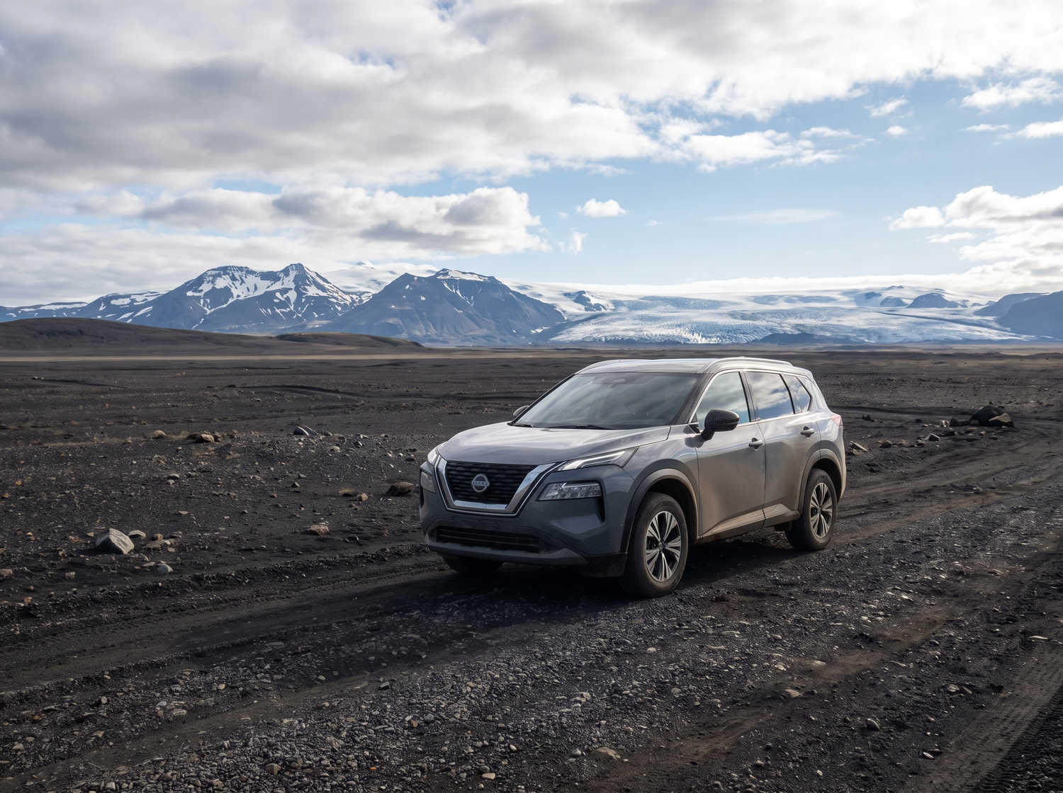Nissan X-Trail. Perfect for off-roading in Iceland's rugged terrains, this SUV rental offers safety features and ample space, ideal for long trips along the ring road and beyond.